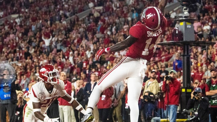 A pass goes over Alabama wide receiver Tyrell Shavers (14) in the end zone against Arkansas at Bryant-Denny Stadium in Tuscaloosa, Ala., on Saturday October 26, 2019.

Bama854