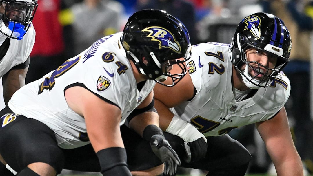 Sep 7, 2025; Orchard Park, New York, USA; Baltimore Ravens quarterback Lamar Jackson (8) with center Tyler Linderbaum (64) and guard Andrew Vorhees (72) at the line of scrimmage in the first quarter against the Buffalo Bills at Highmark Stadium. Mandatory Credit: Mark Konezny-Imagn Images