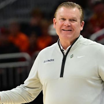 Mar 23, 2025; Milwaukee, WI, USA;  Illinois Fighting Illini head coach Brad Underwood reacts during the second half in the second round of the NCAA Tournament against the Kentucky Wildcats at Fiserv Forum. Mandatory Credit: Benny Sieu-Imagn Images
