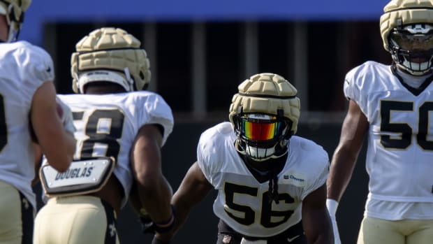 New Orleans Saints linebackers Demario Davis (56) and Anfernee Orji (58) during training camp drills 