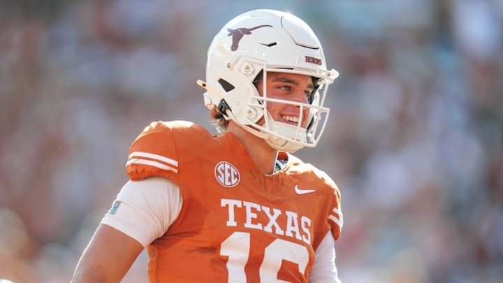 Texas Longhorns quarterback Arch Manning (16) smiles after scoring a touch down as the Texas Longhorns take on Colorado State at Darrell K Royal-Texas Memorial Stadium in Austin Saturday, Aug. 31, 2024.