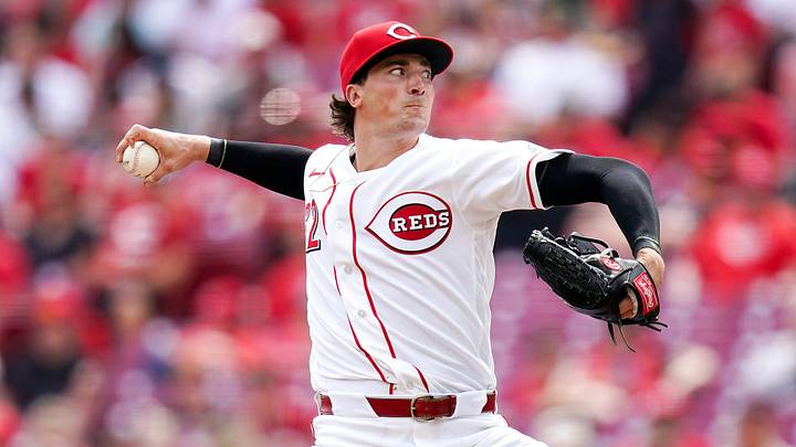 Cincinnati Reds pitcher Kyle Nicolas (62) delivers a pitch