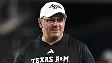 Nov 16, 2024; College Station, Texas, USA; Texas A&M Aggies head coach Mike Elko walks on the field prior to the game against the New Mexico State Aggies at Kyle Field. 