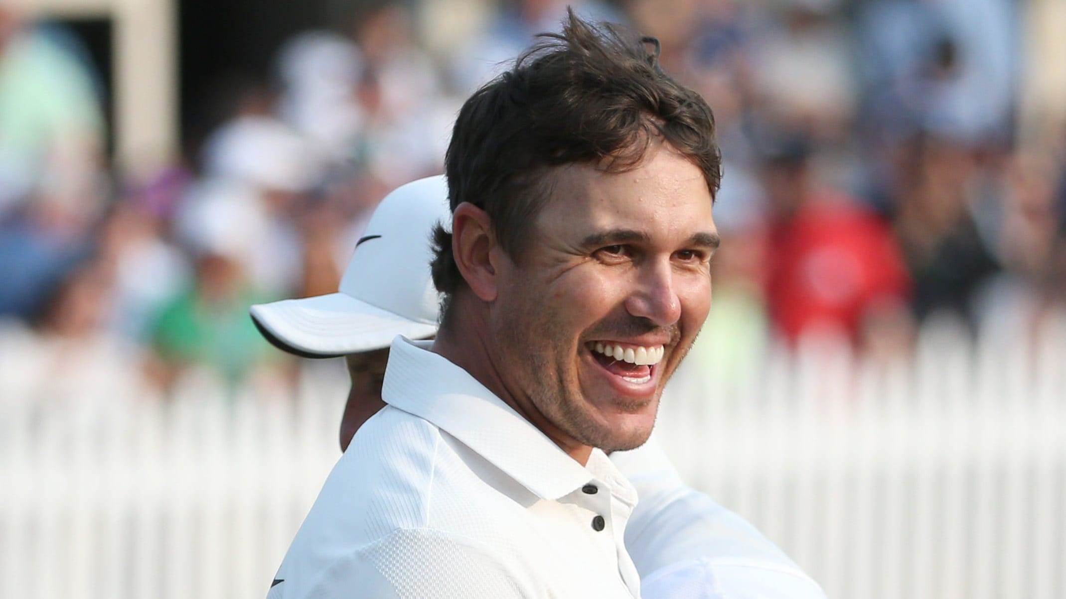 Brooks Koepka celebrates after sinking his final putt on the 18th green to win the 2023 PGA Championship.