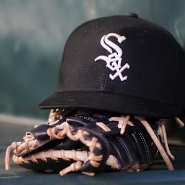 Chicago White Sox hat and glove at Truist Park. 