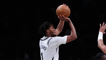Oct 14, 2024; Brooklyn, New York, USA; Brooklyn Nets forward Ziaire Williams (1) shoots a three point jump shot against the Washington Wizards during the second half at Barclays Center. Mandatory Credit: Gregory Fisher-Imagn Images