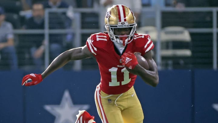 Jan 16, 2022; Arlington, Texas, USA; San Francisco 49ers wide receiver Brandon Aiyuk (11) in action during the NFC Wild Card playoff football game against the Dallas Cowboys at AT&T Stadium. Mandatory Credit: Kevin Jairaj-USA TODAY Sports