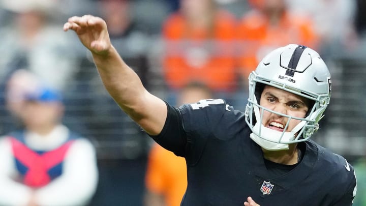 Jan 7, 2024; Paradise, Nevada, USA; Las Vegas Raiders quarterback Aidan O'Connell (4) throws against the Denver Broncos during the second quarter at Allegiant Stadium. Mandatory Credit: Stephen R. Sylvanie-USA TODAY Sports