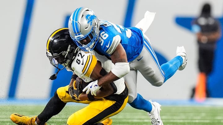 Detroit Lions cornerback Javelin Guidry (36) tackles Pittsburgh Steelers wide receiver Dez Fitzpatrick (82) during the second half of a preseason game at Ford Field in Detroit on Saturday, August 24, 2024.