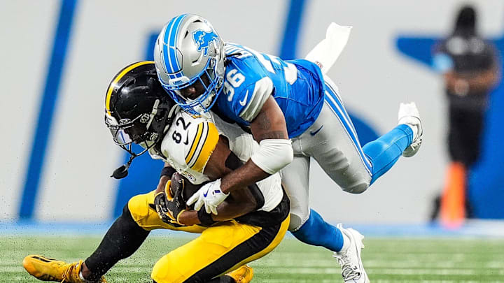 Detroit Lions cornerback Javelin Guidry (36) tackles Pittsburgh Steelers wide receiver Dez Fitzpatrick (82) during the second half of a preseason game at Ford Field in Detroit on Saturday, August 24, 2024.