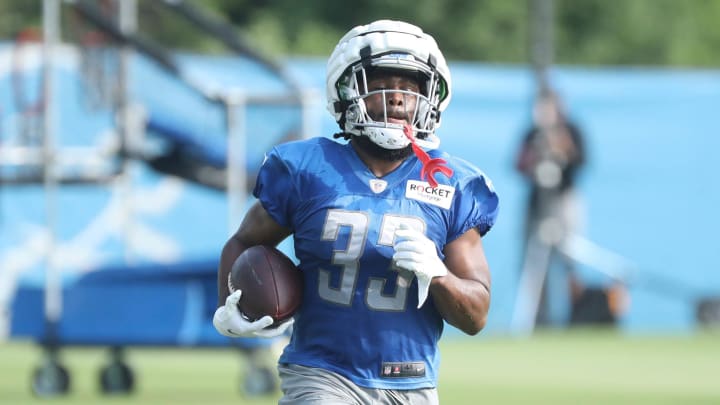 Detroit Lions running back Mohamed Ibrahim (33) runs the ball during training camp  Tuesday, July 25, 2023.