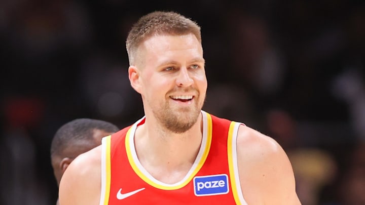 Dec 5, 2025; Atlanta, Georgia, USA; Atlanta Hawks center Kristaps Porzingis (8) reacts after a basket against the Denver Nuggets in the third quarter at State Farm Arena. Mandatory Credit: Brett Davis-Imagn Images
