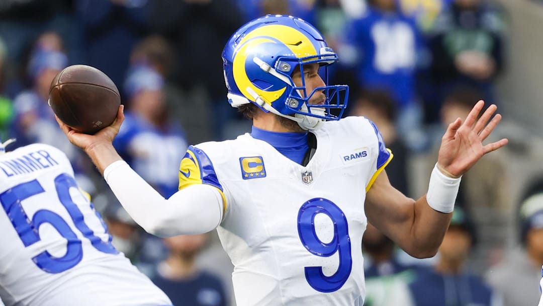 Nov 3, 2024; Seattle, Washington, USA; Los Angeles Rams quarterback Matthew Stafford (9) passes against the Seattle Seahawks during the first quarter at Lumen Field. Mandatory Credit: Joe Nicholson-Imagn Images