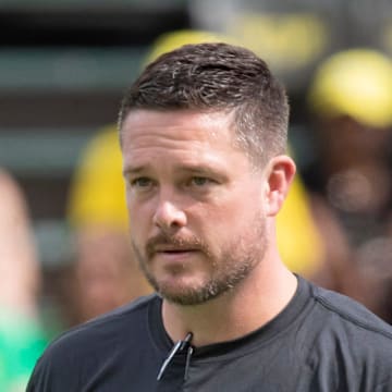 Oregon head coach Dan Lanning walks the field as the Oregon Ducks warm up to host Portland State in the Ducks    season opener Saturday, Sept. 2, 2023, at Autzen Stadium in Eugene, Ore.