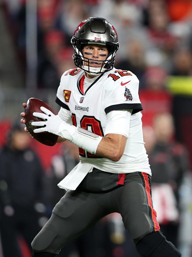 Tampa Bay Buccaneers quarterback Tom Brady drops back to pass against the Dallas Cowboys. Tampa Bay Buccaneers quarterback Tom Brady drops back to pass against the Dallas Cowboys.