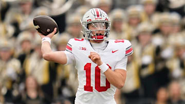 Ohio State Buckeyes quarterback Julian Sayin (10) throws during the NCAA football game against the Purdue Boilermakers at Ross-Ade Stadium in West Lafayette, Ind. on Nov. 8, 2025.