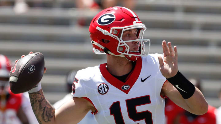 Georgia quarterback Carson Beck (15) throws a pass during the G-Day spring football game in Athens, Ga., on Saturday, April 13, 2024.