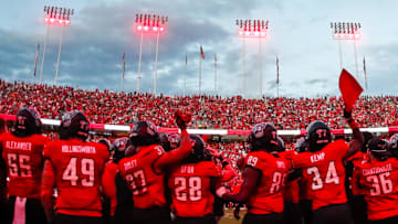 Sep 27, 2025; Raleigh, North Carolina, USA; North Carolina State Wolfpack bench celebrates before the first half of the game against Virginia Tech Hokies at Carter-Finley Stadium. Mandatory Credit: Jaylynn Nash-Imagn Images