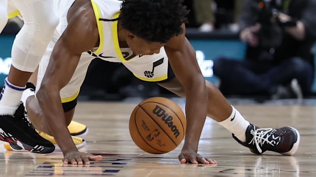     Utah Jazz guard Collin Sexton (2) goes for a loose ball against the Minnesota Timberwolves during the fourth quarter.