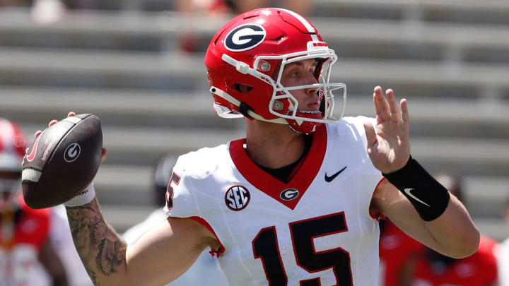 Georgia quarterback Carson Beck (15) throws a pass during the G-Day spring football game in Athens, Ga., on Saturday, April 13, 2024.