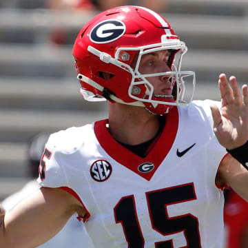 Georgia quarterback Carson Beck (15) throws a pass during the G-Day spring football game in Athens, Ga., on Saturday, April 13, 2024.