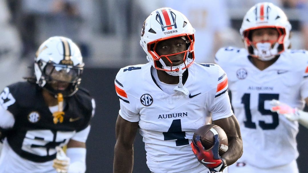 Auburn Tigers wide receiver Malcolm Simmons (4) runs with the ball after a made catch against the Vanderbilt Commodoresduring the first half at FirstBank Stadium. 