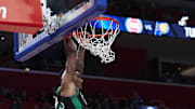 Dec 10, 2017; Detroit, MI, USA; Boston Celtics guard Marcus Smart (36) dunks in the first half against the Detroit Pistons at Little Caesars Arena. Mandatory Credit: Rick Osentoski-Imagn Images