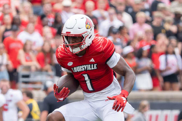 Louisville Cardinals wide receiver Ja'Corey Brooks (1) runs the ball