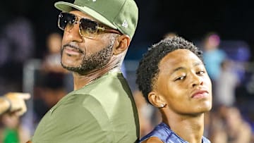 Jul 12, 2025; Memphis, TN, USA; Quincy Wilson with his coach Joe Lee during the Ed Murphey Classic at University of Memphis.