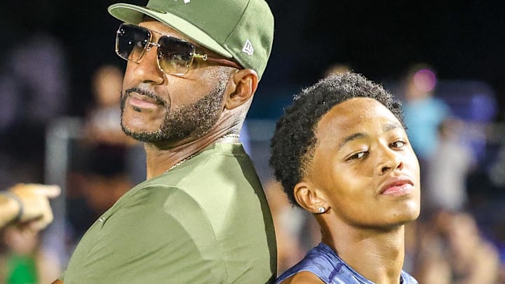 Jul 12, 2025; Memphis, TN, USA; Quincy Wilson with his coach Joe Lee during the Ed Murphey Classic at University of Memphis.