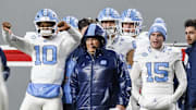 Nov 29, 2025; Raleigh, North Carolina, USA;  North Carolina Tar Heels head coach Bill Belichick on the sideline during the first half of the game against NC State Wolfpack at Carter-Finley Stadium.  Mandatory Credit: Jaylynn Nash-Imagn Images
