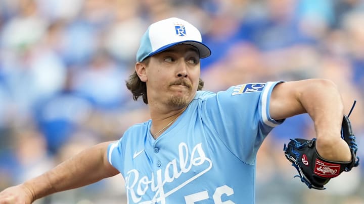 Kansas City Royals relief pitcher Hunter Harvey (56) pitches during the eighth inning against the Cleveland Guardians at Kauffman Stadium.