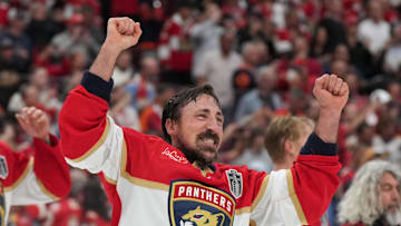 Jun 17, 2025; Sunrise, Florida, USA; Florida Panthers center Brad Marchand (63) celebrates with his teammates after winning game six of the 2025 Stanley Cup Final against the Edmonton Oilers at Amerant Bank Arena. Mandatory Credit: Jim Rassol-Imagn Images