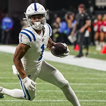 Dec 24, 2023; Atlanta, Georgia, USA; Indianapolis Colts wide receiver Josh Downs (1) runs after a catch against the Atlanta Falcons during the second half at Mercedes-Benz Stadium. 