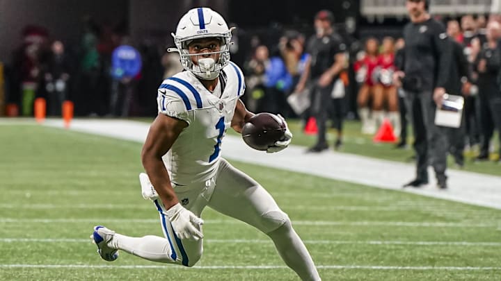 Dec 24, 2023; Atlanta, Georgia, USA; Indianapolis Colts wide receiver Josh Downs (1) runs after a catch against the Atlanta Falcons during the second half at Mercedes-Benz Stadium. 