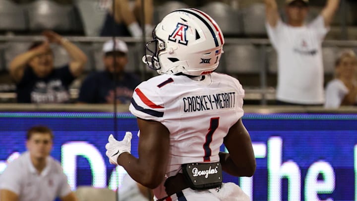 Aug 31, 2024; Tucson, Arizona, USA; Arizona Wildcats running back Jacory Croskey-Merritt (1) scores a touchdown during fourth quarter at Arizona Stadium