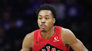 Toronto Raptors forward Scottie Barnes (4) dribbles up the floor against the Philadelphia 76ers during the third quarter at Xfinity Mobile Arena.