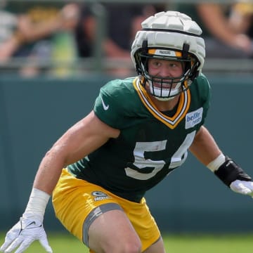 Green Bay Packers linebacker Kristian Welch (54) runs through a drill during the 11th practice of training camp on Tuesday, August 6, 2024, at Ray Nitschke Field in Ashwaubenon, Wis. 