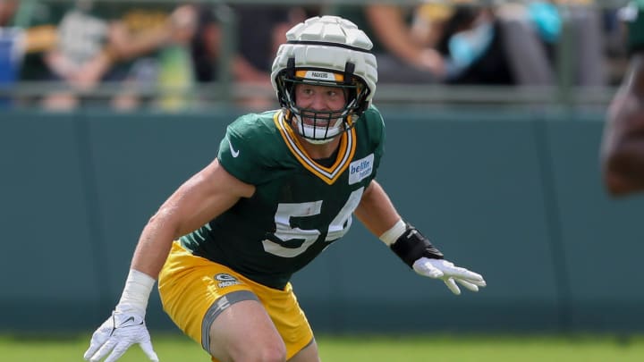 Green Bay Packers linebacker Kristian Welch (54) runs through a drill during the 11th practice of training camp on Tuesday, August 6, 2024, at Ray Nitschke Field in Ashwaubenon, Wis. 