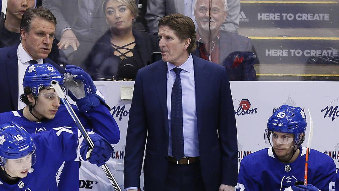 Apr 17, 2019; Toronto, Ontario, CAN; Toronto Maple Leafs head coach Mike Babcock (center) looks on from the bench during game four of the first round of the 2019 Stanley Cup Playoffs against the Boston Bruins at Scotiabank Arena. Boston defeated Toronto. Mandatory Credit: John E. Sokolowski-Imagn Images Apr 17, 2019; Toronto, Ontario, CAN; Toronto Maple Leafs head coach Mike Babcock (center) looks on from the bench during game four of the first round of the 2019 Stanley Cup Playoffs against the Boston Bruins at Scotiabank Arena. Boston defeated Toronto. Mandatory Credit: John E. Sokolowski-Imagn Images