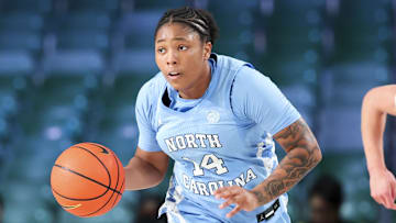 Nov 25, 2024; Paradise Island, Bahamas, BHS; North Carolina Tar Heels guard Trayanna Crisp (14) dribbles during the second half against the Indiana Hoosiers at the Atlantis Resort. Mandatory Credit: Kevin Jairaj-Imagn Images