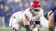Dec 26, 2024; Phoenix, AZ, USA; Rutgers Scarlet Knights offensive lineman Gus Zilinskas (59) against the Kansas State Wildcats during the Rate Bowl at Chase Field. Mandatory Credit: Mark J. Rebilas-Imagn Images