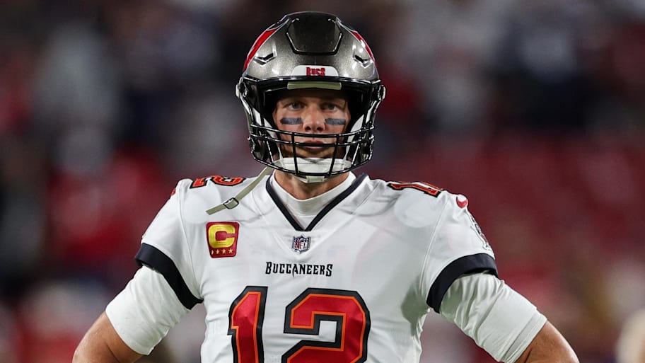 Jan 16, 2023; Tampa, Florida, USA; Tampa Bay Buccaneers quarterback Tom Brady (12) looks on before a  wild card game against the Dallas Cowboys at Raymond James Stadium. Mandatory Credit: Nathan Ray Seebeck-Imagn Images | Nathan Ray Seebeck-Imagn Images