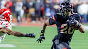No. 4 Centennial's Malaki Davis runs into open space during the Huskies playoff win over Mater Dei. Centennial will face No. 14 Santa Margarita in the CIF Southern Section Division 1 final on Friday, November 28. 