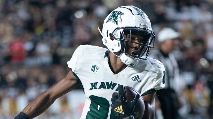 Hawaii Warriors wide receiver Pofele Ashlock (86) runs after a catch against Hawaii at FirstBank Stadium in Nashville, Tenn., Saturday night, Aug. 26, 2023.