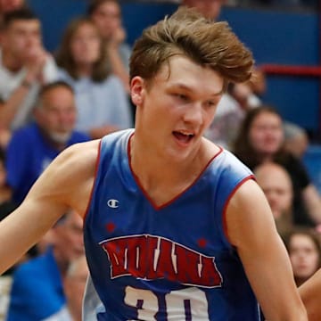 Indiana Junior All-Star Braylon Mullins (30) defends Indiana Senior All-Star Keenan Garner (10) during the Indiana Boys Junior-Senior All-Star Game, Wednesday, June 5, 2024, at Kokomo Memorial Gym in Kokomo, Ind.