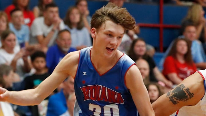 Indiana Junior All-Star Braylon Mullins (30) defends Indiana Senior All-Star Keenan Garner (10) during the Indiana Boys Junior-Senior All-Star Game, Wednesday, June 5, 2024, at Kokomo Memorial Gym in Kokomo, Ind.