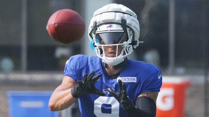 Bills defensive back Taylor Rapp eyes in the ball during interception drills.