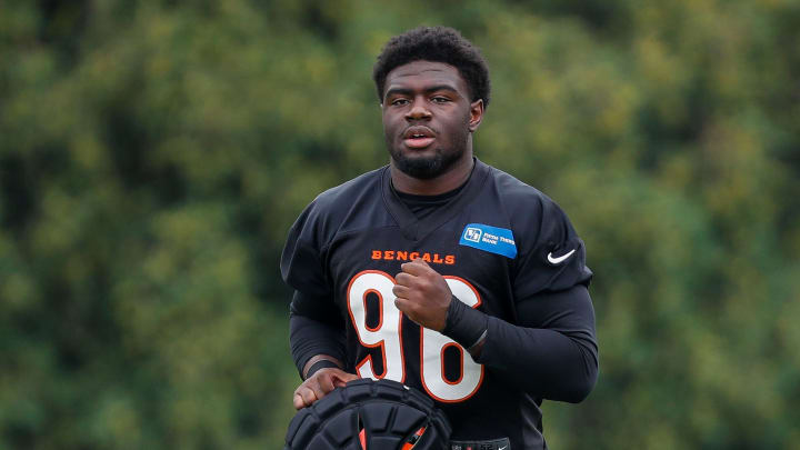 Jul 26, 2023; Cincinnati, OH, USA; Cincinnati Bengals defensive end Cam Sample (96) walks onto the field during training camp at Kettering Health Practice Fields. 