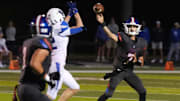 Christian Academy-Louisville’s Jackson Burke throws a complete pass to Jeffrey Vazzana against Lexington Christian Friday night.
Sept. 5, 2025